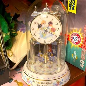 I precious moments clock works well no issues